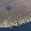 General oblique aerial view of the coast of Rum at Sgorr Mor, looking NNE.