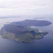 General oblique aerial view of Eigg with Muck beyond, looking S.