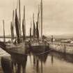 Copy of photograph titled 'Fishing boats on the Caledonian Canal at Banavie'