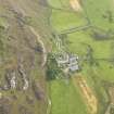 Oblique aerial view of Oronsay Farm and Priory, taken from the NW.