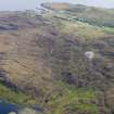 General oblique aerial view of Scalsaig and Bein nan Gudairean viewed from Loch Fada, taken from the NW.