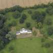 Oblique aerial view of the house taken from the SSE.