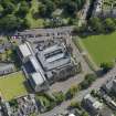 Oblique aerial view of the academy taken from the SE.