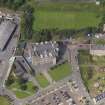 Oblique aerial view of the school taken from the SSE.