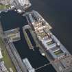General oblique aerial view of the harbour area, centred on the Victoria Dock taken from the W.