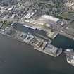 General oblique aerial view of the harbour area, centred on the Victoria Dock taken from the ESE.