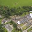 General oblique aerial view of the Tealing Home Farm centred on the dovecot taken from the E.