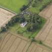 General oblique aerial view of South Balluderon Farm centred on the house, taken from the SE.