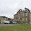 General view of Cumbernauld House, Cumbernauld, taken from the South. The main house and the East elevation of the Eastern Pavilion can be seen.