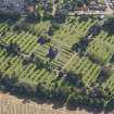 General oblique aerial view of the Western Cemetery, centred on the mortuary chapel, taken from the NW.