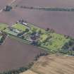 General oblique aerial view of the Ethie estate, centred on Ethie Castle, taken from the NNW.