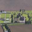General oblique aerial view of the Ethie estate, centred on Ethie Castle, taken from the N.