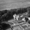 Senwick House and Walled Garden, Borgue.  Oblique aerial photograph taken facing north.