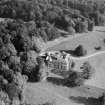 Earlston House, Borgue.  Oblique aerial photograph taken facing east.  Prior to its demolition in about 1954.