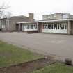 Main block E and Gymnasium. General view from SE
