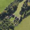 General oblique aerial view of the Downie Park House estate, centred on the stables and farmsteading taken from the NNW.