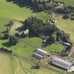 General oblique aerial view of Baldovie Farm, centred on Baldovie farmhouse taken from the NW.
