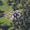 General oblique aerial view of Kinnaird Castle estate, centred on Kinnaird Castle, taken from the E.