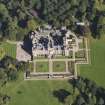 General oblique aerial view of Kinnaird Castle estate, centred on Kinnaird Castle, taken from the SW.