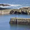 Harbour walls. View from SW