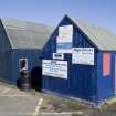 Wooden fisherman's huts to W of inner harbour. Detail