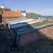 Working building and Fisherman's sheds to S of Old Harbour. View from SSE