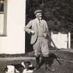 View of man and dog, probably at Eigg. 
Titled: 'Donald McLean and Prince'

