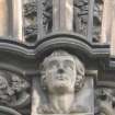 View of head of Robert Burns, at top of pilaster on W side (facing W).