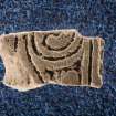 View of cross-slab fragment with spiral decoration