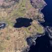 Oblique aerial view centred on Loch na h-Airde, the 'Viking Canal’ and Rubh' an Dunain, taken from the SW.