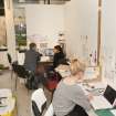 View of students within the studio space of the visual communications department of the Foulis Building