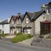 View of 5, 7, 9, 11, 13 and 15 Ardmory Road, Ardbeg, Rothesay, Bute, from SW