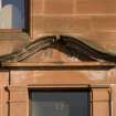 Detail of broken pediment above doorway at 17 Battery Place, Rothesay, Bute