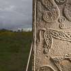Detail of ogham inscription on left hand side of rear face of the Rodney Stone (flash)