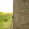 Detail of ogham inscription on left hand side of rear face of the Rodney Stone (daylight)