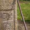 Detail of ogham inscription on right hand side of front face of the Rodney Stone (daylight)