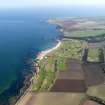 General oblique aerial view centred on Kingsbarns Golf Course, with the Cambo Estate beyond, taken from NW.