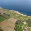 Oblique aerial view of Kingsbarns Golf Course, with the Cambo Estate to the fore, taken from S.