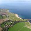 Oblique aerial view of Kingsbarns Golf Course, with the Cambo Estate to the foreground, taken from S.
