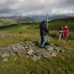 Ian Parker of RCAHMS and volunteers surveying at Dun Burgidale, Bute.