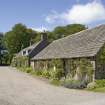 Farm, gardener's and coachman's cottages from south east.