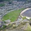 Oblique aerial view of Burntisland Links, site of former golf course, taken from the SSE.