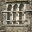 S facade, detail of triple arched window at ground floor level