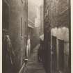 View of Close No 31 Saltmarket, Glasgow inscribed 'Close No 31 Saltmarket, 1868'. Copied from 'Old closes and streets [of Glasgow]: a series of photogravures 1868-1899', printed for the Corporation of Glasgow, July 1900, Plate 26.