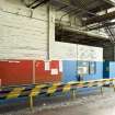 Interior. East wall of north two bays of foundry building.