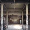 Interior. Former boiler room area, from S. Post 1913. Cast iron columns and concrete roof.
