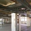 Interior. Main building, First Floor. Wing D. Second phase c.1915 extension.The structural steel visible is part of the rubber footwear production line installed by Gates in the 1990s.