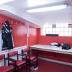 Interior. Main stand, groound floor, match official's room, view from NW