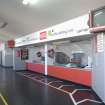 Interior. Main stand, upper concourse, view of snack bar from W