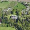 Oblique aerial view of Cawdor Castle and policies, taken from the WSW.